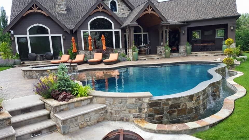 Resort style pool with integrated spa